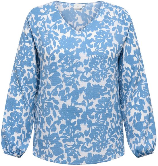 Blouse bleu clair à imprimé floral blanc, col en V et manches longues bouffantes.