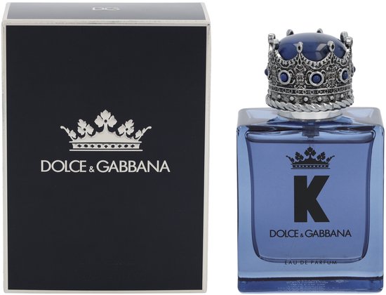 Dolce & Gabbana K Eau de Parfum spray naast de zwarte doos met kroon logo.