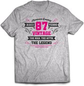 87 Jaar Legend - Feest kado T-Shirt Heren / Dames - Antraciet Grijs / Roze - Perfect Verjaardag Cadeau Shirt - grappige Spreuken, Zinnen en Teksten. Maat 3XL