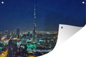 Muurdecoratie Dubai en de Burj Khalifa verlicht in de avond - 180x120 cm - Tuinposter - Tuindoek - Buitenposter