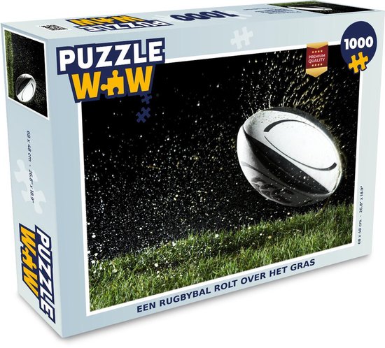 Puzzle Rugby 1000 pièces - Un ballon de rugby roule sur l'herbe | bol.com