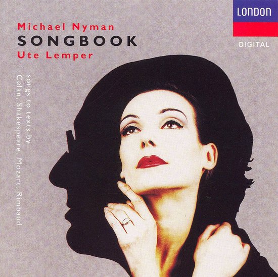 Ute Lemper, "Songbook" albumhoes met zwarte hoed, rode lippen en de schaduw van een man.