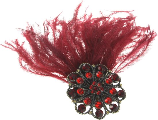 Broche avec pierres et plumes