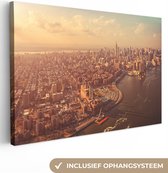 Canvas schilderij 140x90 cm - Wanddecoratie New York - Skyline - Goud - Muurdecoratie woonkamer - Slaapkamer decoratie - Kamer accessoires - Schilderijen