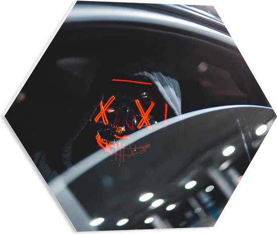 WallClassics - PVC Schuimplaat Hexagon  - Man met Lichtgevend Masker in Auto - 50x43.5 cm Foto op Hexagon (Met Ophangsysteem)