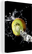 Canvas schilderij 90x140 cm - Wanddecoratie Kiwi - Fruit - Stilleven - Water - Zwart - Muurdecoratie woonkamer - Slaapkamer decoratie - Kamer accessoires - Schilderijen