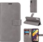 Retro kalfspatroon gesp horizontale flip lederen tas met houder & kaartsleuven & portemonnee voor LG K22 (grijs)