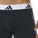 Zwarte boxer met een witte band met zwarte Adidas logo's.