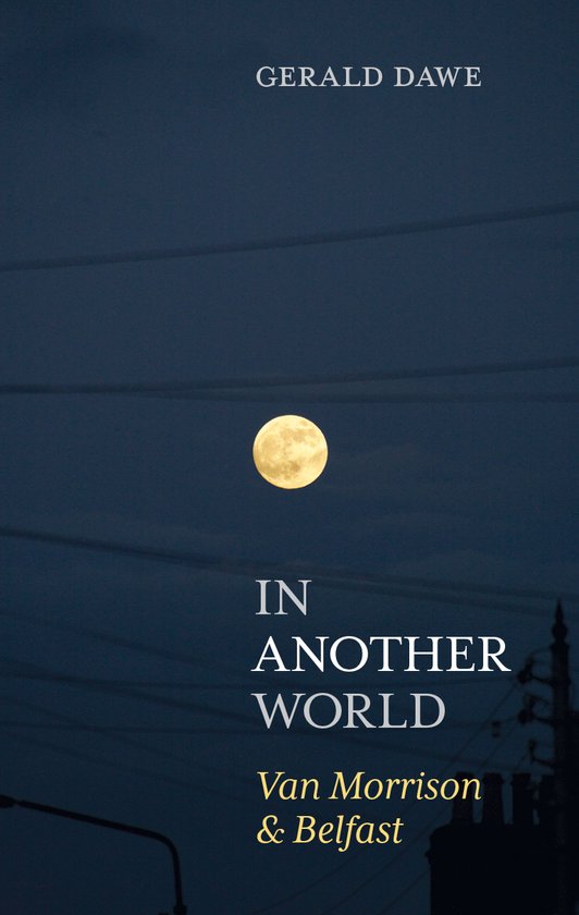 Boek "In Another World" van Gerald Dawe, met een volle maan en siloëtten van gebouwen op een schemerige lucht.