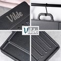 Collage: logo Vilde op grillplaat, handvat, detail van hoek, detail van ribbels.
