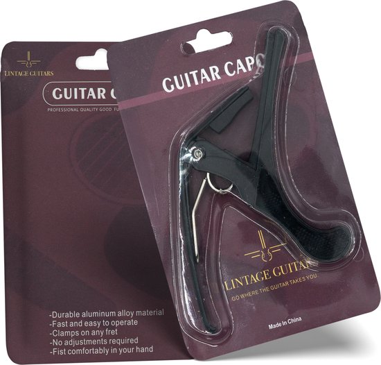 Twee verpakkingen met zwarte gitaarcapo's. Eén met "GUITAR CAPO" en "LINTAGE GUITARS", de andere met producteigenschappen.