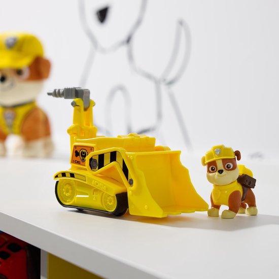 Gele Paw Patrol bulldozer speelgoedauto met Rubble speelfiguur.