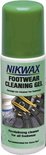 Groene Nikwax Footwear Cleaning Gel fles met afbeelding van schoenen en schuim.