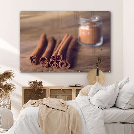 MuchoWow® Peinture sur verre 150x100 cm - Peinture sur verre acrylique - Bâtons de cannelle aromatiques sur une table en bois - Photo sur verre - Peintures