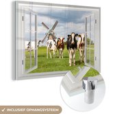 MuchoWow® Glasschilderij 60x40 cm - Schilderij acrylglas - Doorkijk - Koe - Molen - Foto op glas - Schilderijen