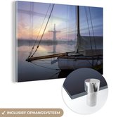 MuchoWow® Glasschilderij 120x80 cm - Schilderij acrylglas - Zeilboot vaart over de wateren van het Nationaal park The Broads in Engeland - Foto op glas - Schilderijen