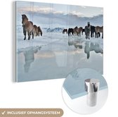 MuchoWow® Glasschilderij 150x100 cm - Schilderij acrylglas - Paarden - IJs - Sneeuw - Foto op glas - Schilderijen