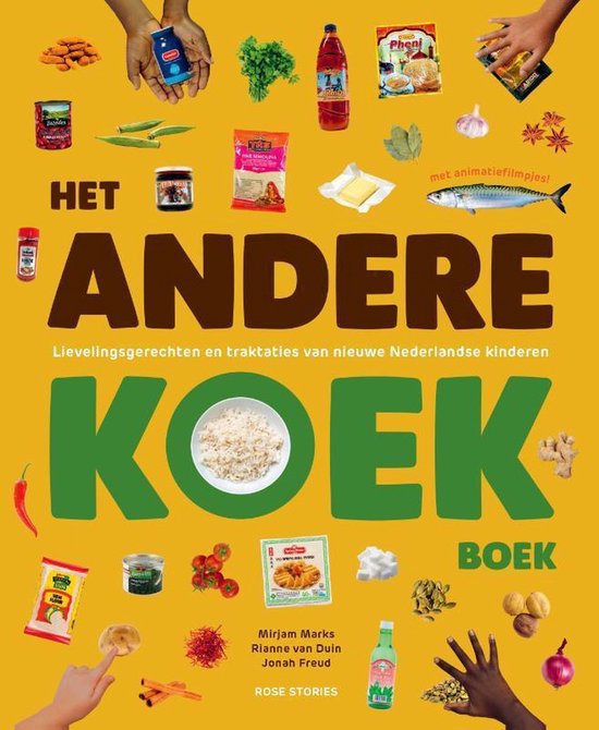 Boekomslag 'Het Andere Koek Boek' met diverse ingrediënten, specerijen en een makreel.