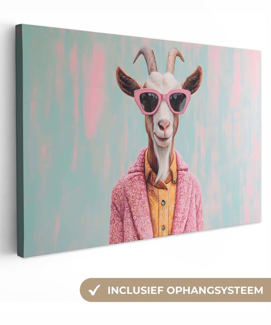 Zijaanzicht van een schilderij van een geit met zonnebril en roze jas, met tekst 'inclusief ophangsysteem'.