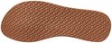 Onderkant van een cognacbruine Reef slipper met een visgraatprofiel.