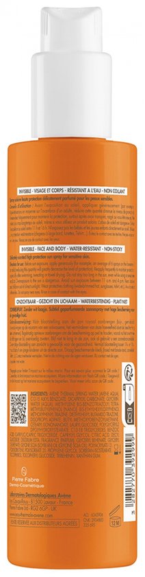 Oranje sprayfles met witte dop. Tekst in het Frans en Engels over zonnebrandcrème.