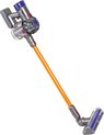Een oranje en grijze speelgoed Dyson stofzuiger op een witte achtergrond.