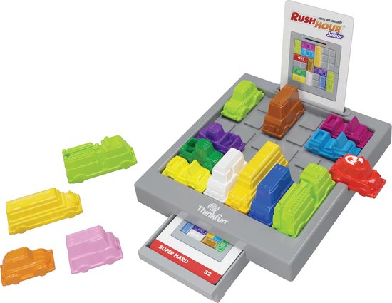 Rush Hour Junior spel met het speelbord, auto's, vrachtwagens en puzzelkaarten.