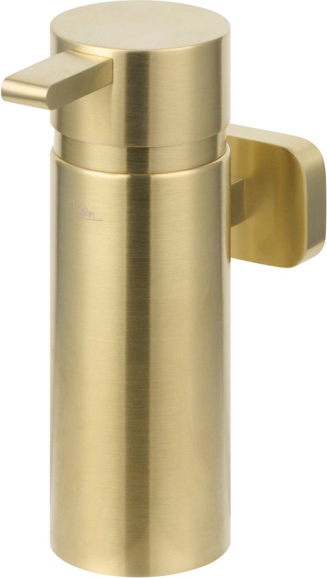 Geborstelde gouden zeepdispenser van het merk Ben, gemonteerd aan de muur.