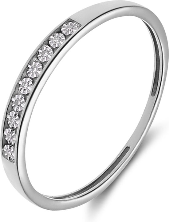 Bague pour femme en or blanc sertie de 9 diamants.