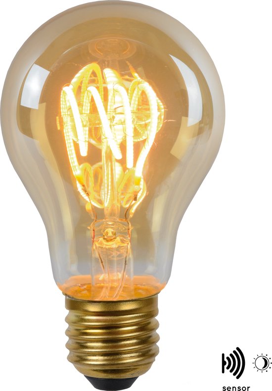 Ampoule A60 ambrée avec filament visible et symbole de détecteur jour/nuit.