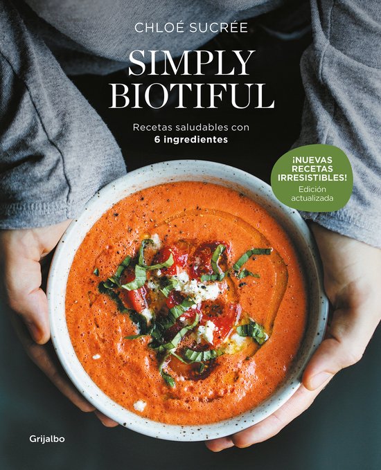 Boek "Simply Biotiful" met een kom gazpacho, tekst "Gezonde recepten met 6 ingrediënten".