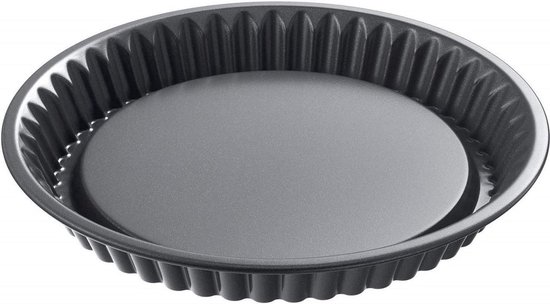 Moule à tarte rond gris avec bord côtelé et fond plat.
