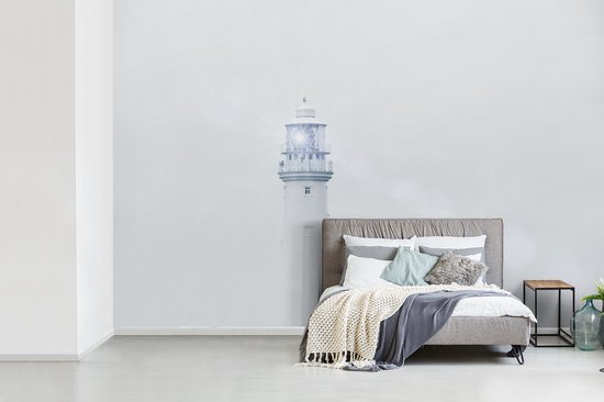Behang - Fotobehang Vuurtoren in de mist - Breedte 600 cm x hoogte 400 cm