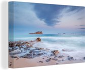 Canvas Schilderij Weergave van het strand Cala Comte op Ibiza - 180x120 cm - Wanddecoratie XXL