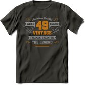 49 Jaar Legend T-Shirt | Goud - Zilver | Grappig Verjaardag Cadeau | Dames - Heren | - Donker Grijs - XL