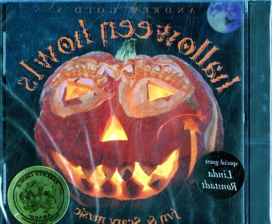 Voorkant van Halloween Howls CD met een verlichte pompoen, een heks op een bezem en een volle maan.
