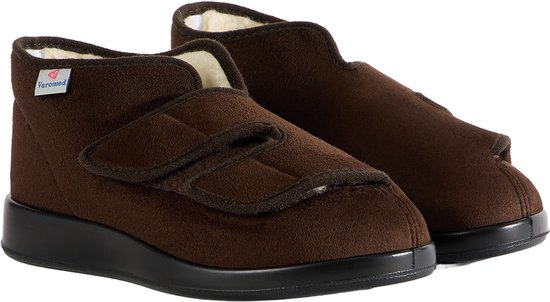 Bruine Varomed pantoffels met klittenbandsluiting en witte voering.
