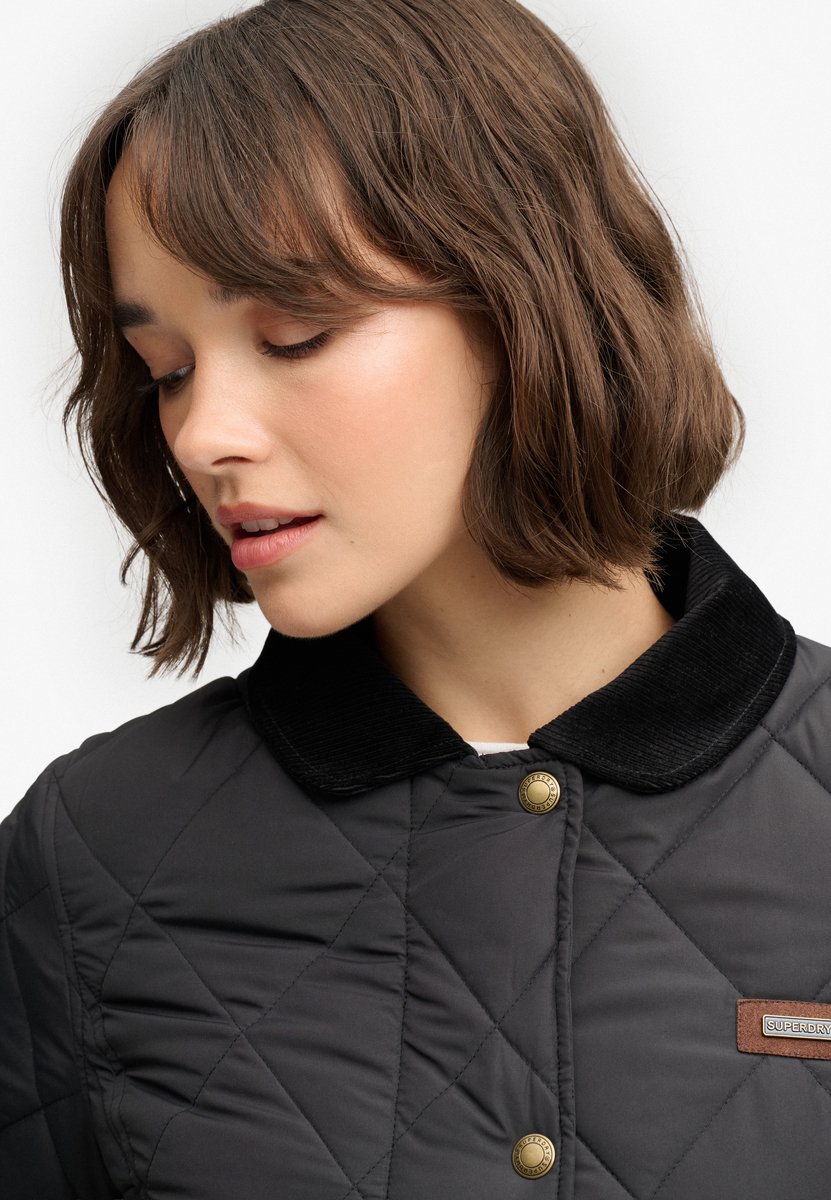 Superdry Gevoerde jas met ribfluwelen afwerking Dames Gewatteerde jassen Zwart