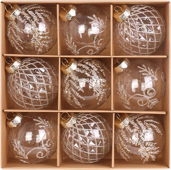 Ensemble de 9 boules de Noël transparentes dans une boîte, avec paillettes dorées et divers motifs.