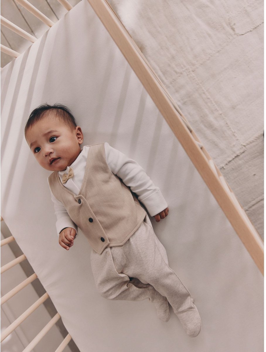 Next Slimme baby pyjama met strik stropdas