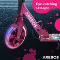 Voorwiel van een roze AREBOS step met LED-verlichting en "Eye-catching LED-light" tekst.