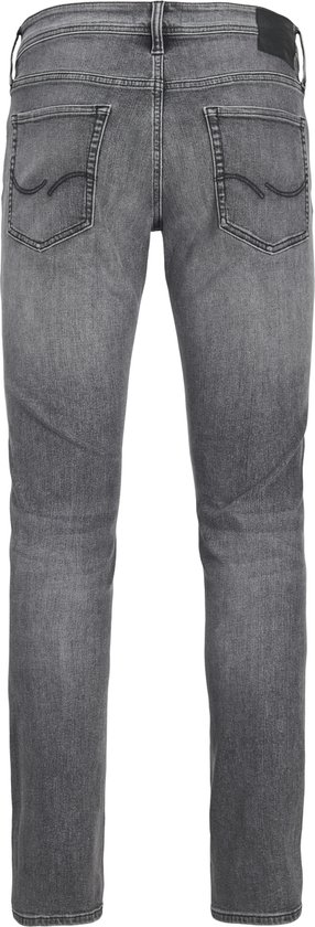 Achterkant van grijze slim fit jeans met zakken.