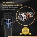 Close-up van de krachtige motor van een zwarte tondeuse, bekroond tot 'Beste motor 2024'.
