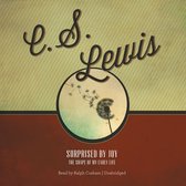 Boekcover met de titel 'Surprised by Joy: The Shape of My Early Life' door C.S. Lewis, met een dandelion in een cirkel.