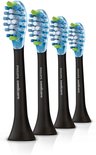 Vier zwarte Philips Sonicare C3 opzetborstels met blauwe en groene borstelharen.