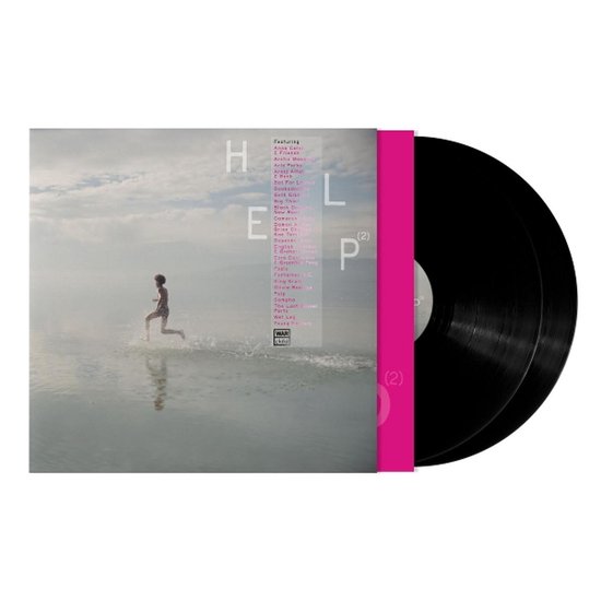 LP hoes met 'HELP(2)' artwork, met een kind dat door het water rent. Naast de hoes ligt een zwarte LP.