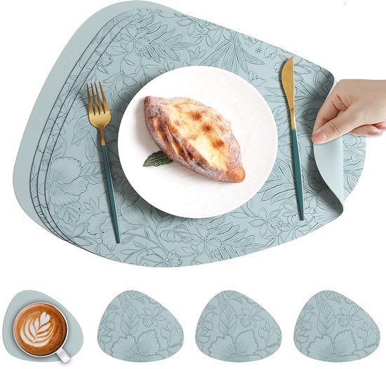 Set de table bleu clair à motif floral, avec une assiette, un croissant, des couverts, une tasse à café et gros plan des sets de table.