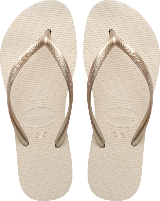 Lichtbeige Havaianas slippers met goudkleurige bandjes, maat 37-38.