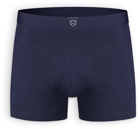 Donkerblauwe boxershort met een elastische tailleband met een wit logo.