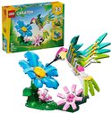 Boîte LEGO Creator 3 en 1 Colibri Coloré avec un colibri à construire près d'une fleur bleue et rose.